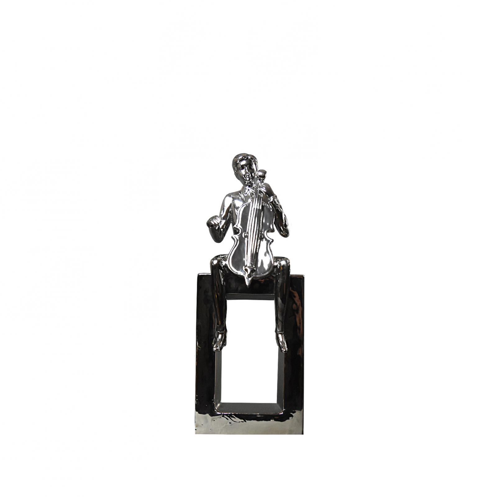 cello player silver sculpture