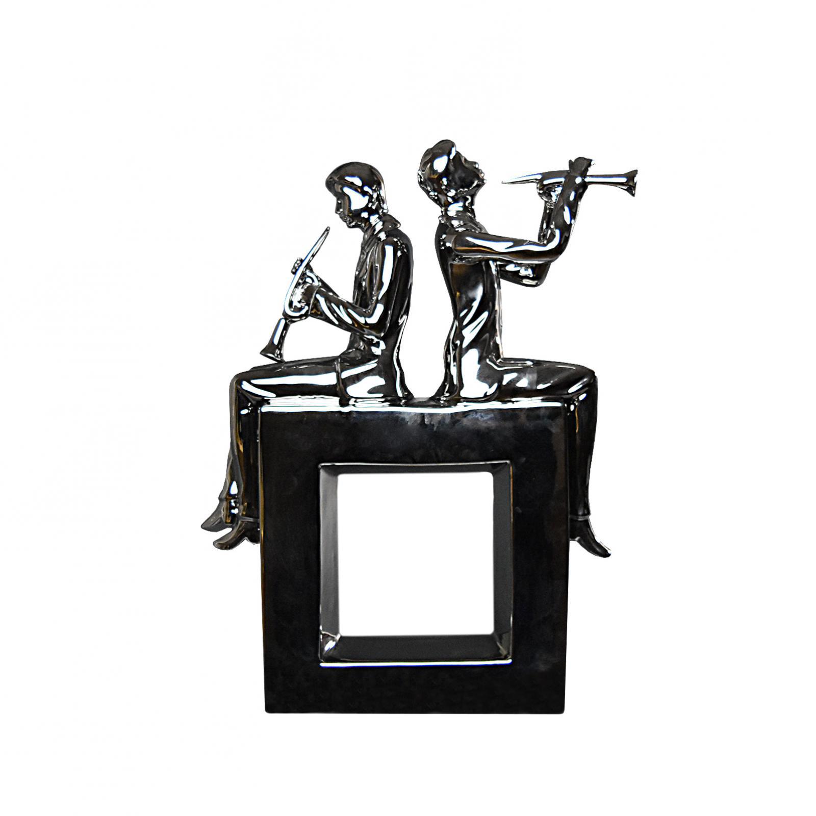 trumpet players silver sculpture